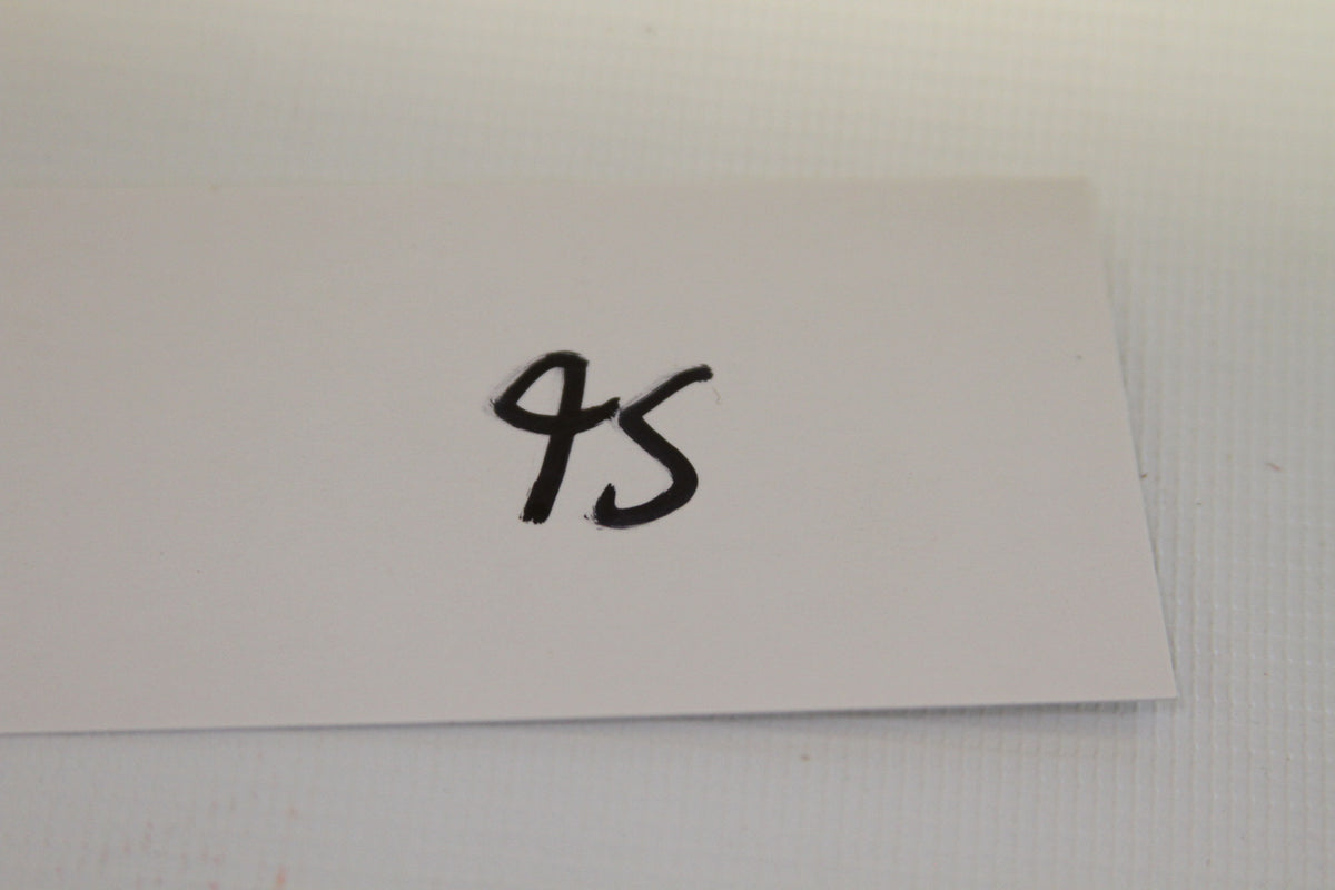 Index card with number 95 written in marker