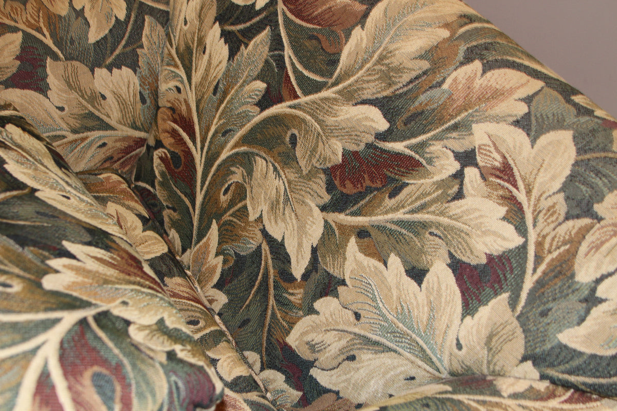 Detail of woven leaf fabric pattern on chair