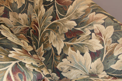 Detail of woven leaf fabric pattern on chair