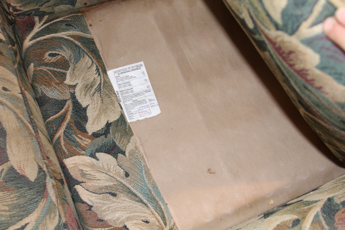 Under the seat of chair showing materials label