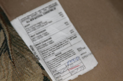 Label with composition and care details inside chair