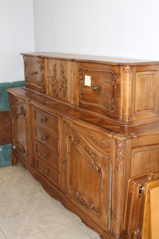 French Provincial sideboard and hutch with carved wood details and multiple drawers and cabinets