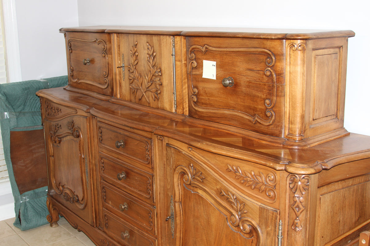 Elegant Louis XV style buffet with walnut wood and intricate floral carvings