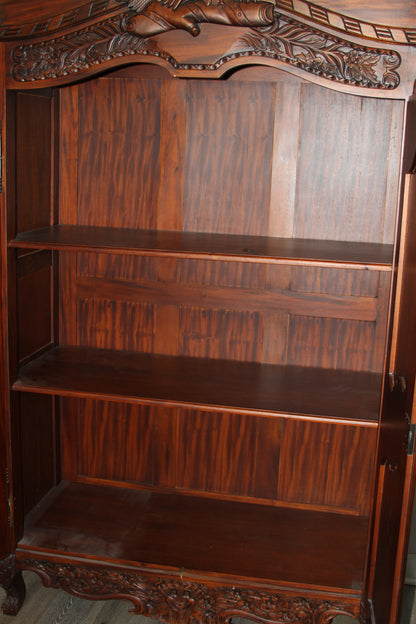 Interior of armoire with three spacious wooden shelves