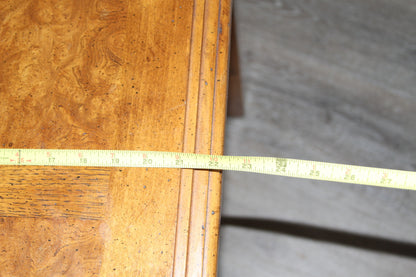 Measurement of end table depth with tape measure