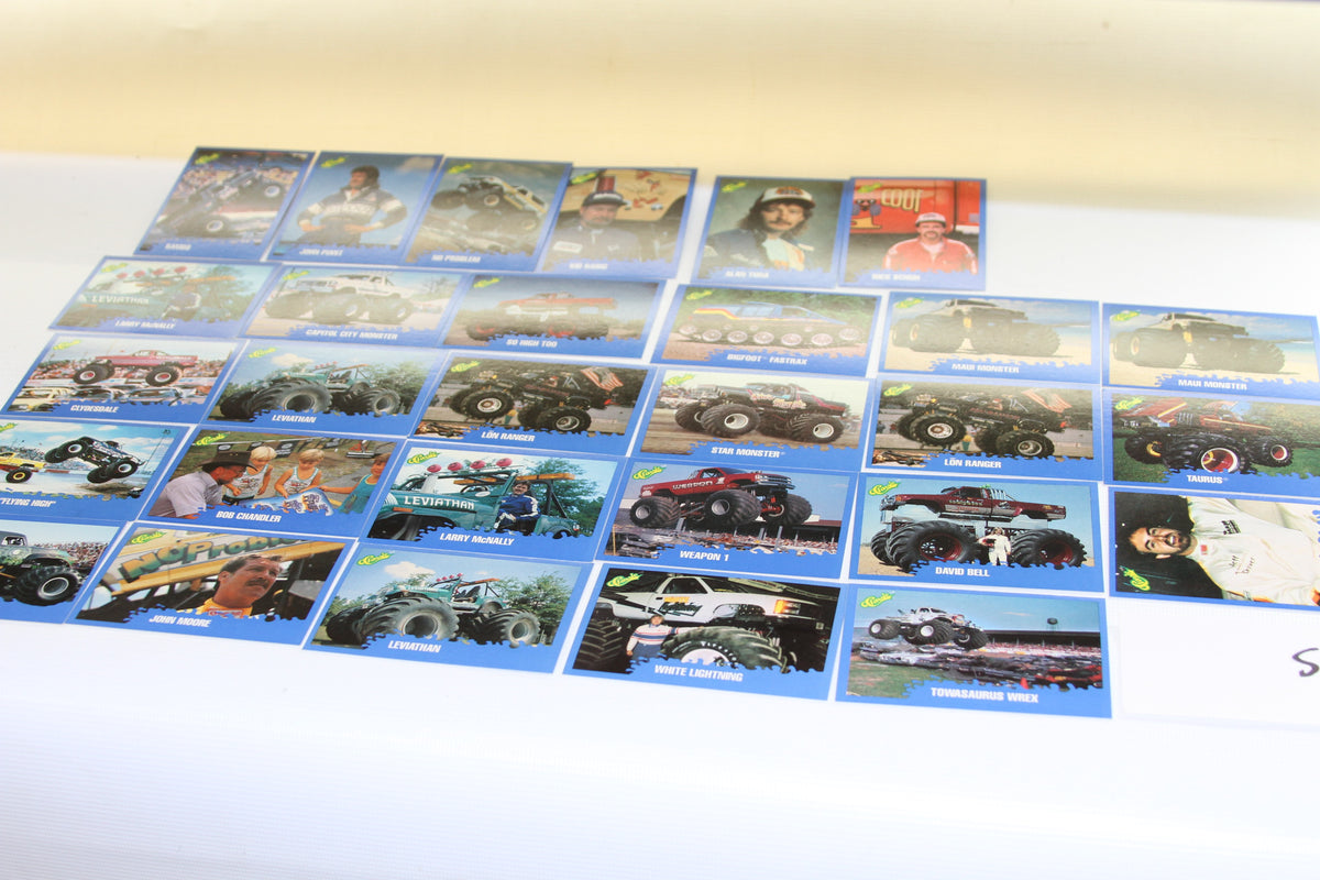 Full set of 1990 Classic Monster Truck trading cards displayed in rows