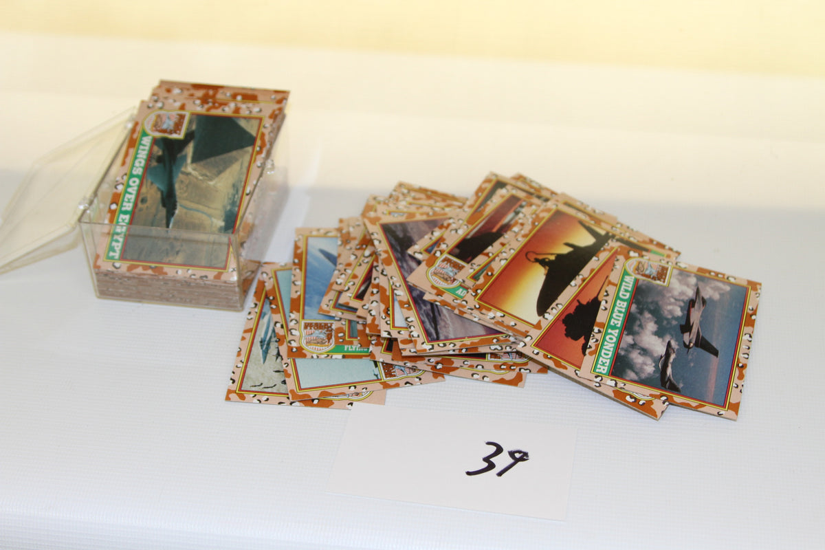 Stack of 1991 Topps Desert Storm trading cards and case