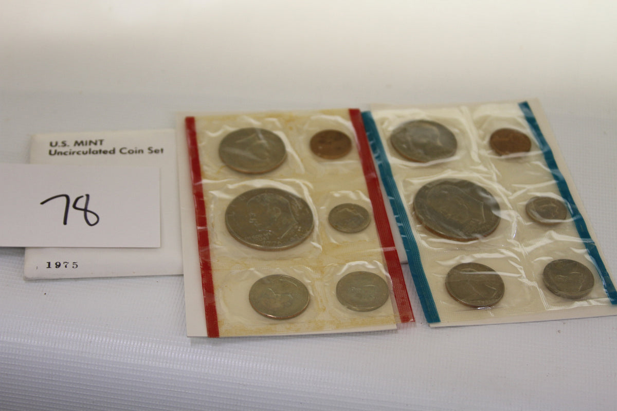 1975 U.S. Mint Uncirculated Coin Set with packaging and coins in sealed plastic