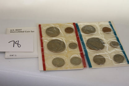 1975 U.S. Mint Uncirculated Coin Set with packaging and coins in sealed plastic