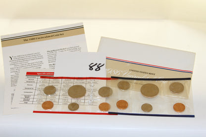 1986 United States Mint uncirculated coin set with info card and coins in plastic sleeve
