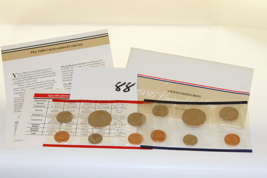 1986 United States Mint uncirculated coin set with info card and coins in plastic sleeve