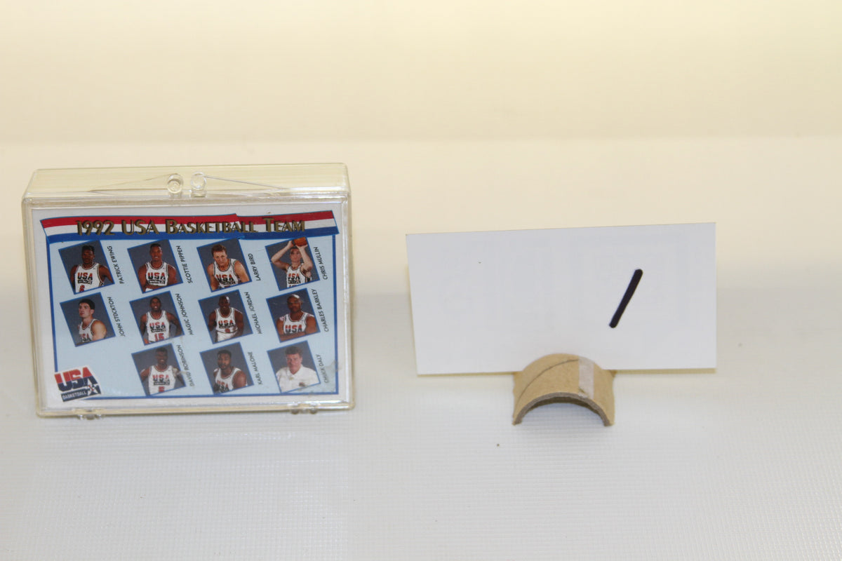 1992 USA Basketball Team card set in plastic case next to a card holder