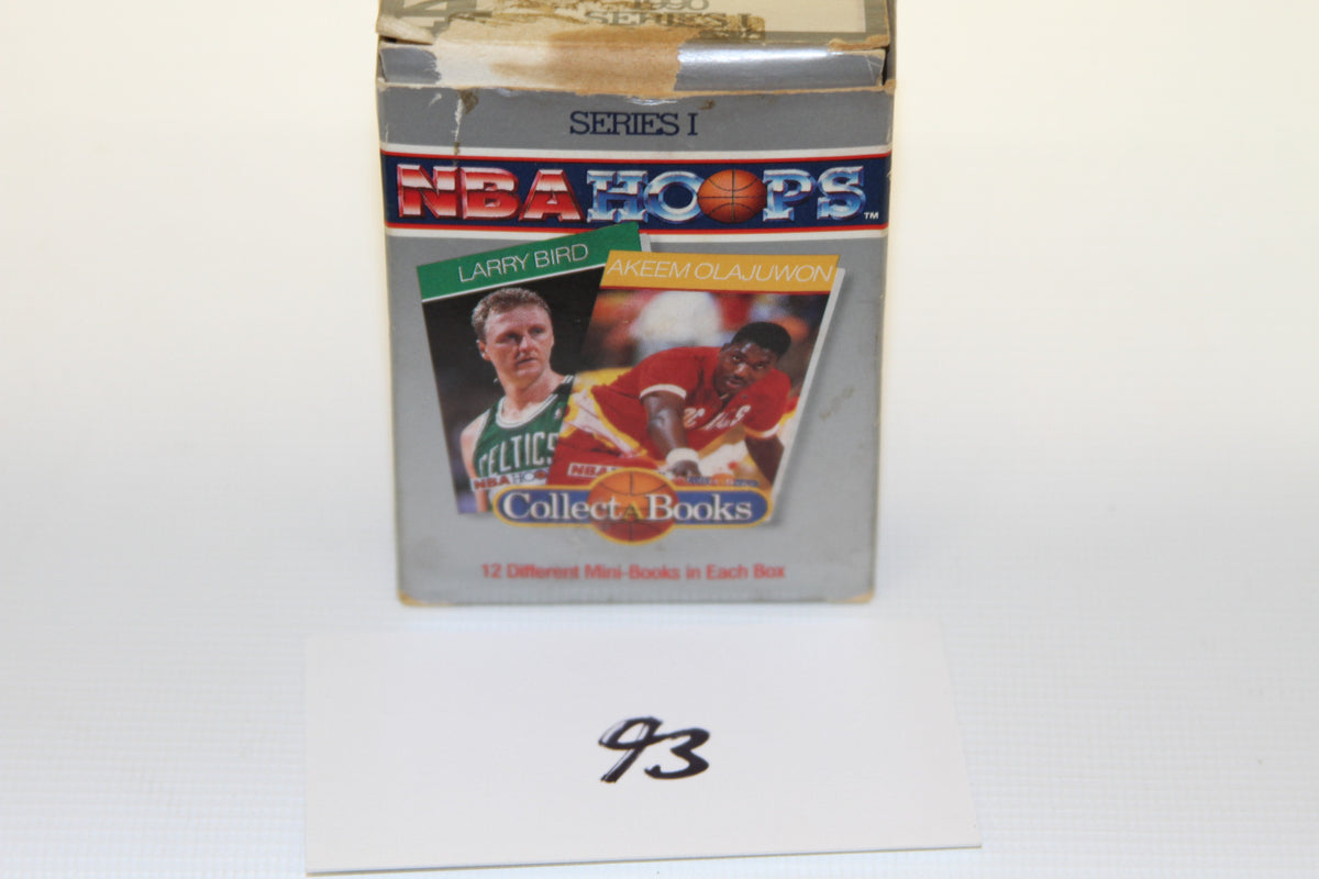 Box of 1990 NBA Hoops Collect-A-Books Series I featuring Larry Bird and Akeem Olajuwon