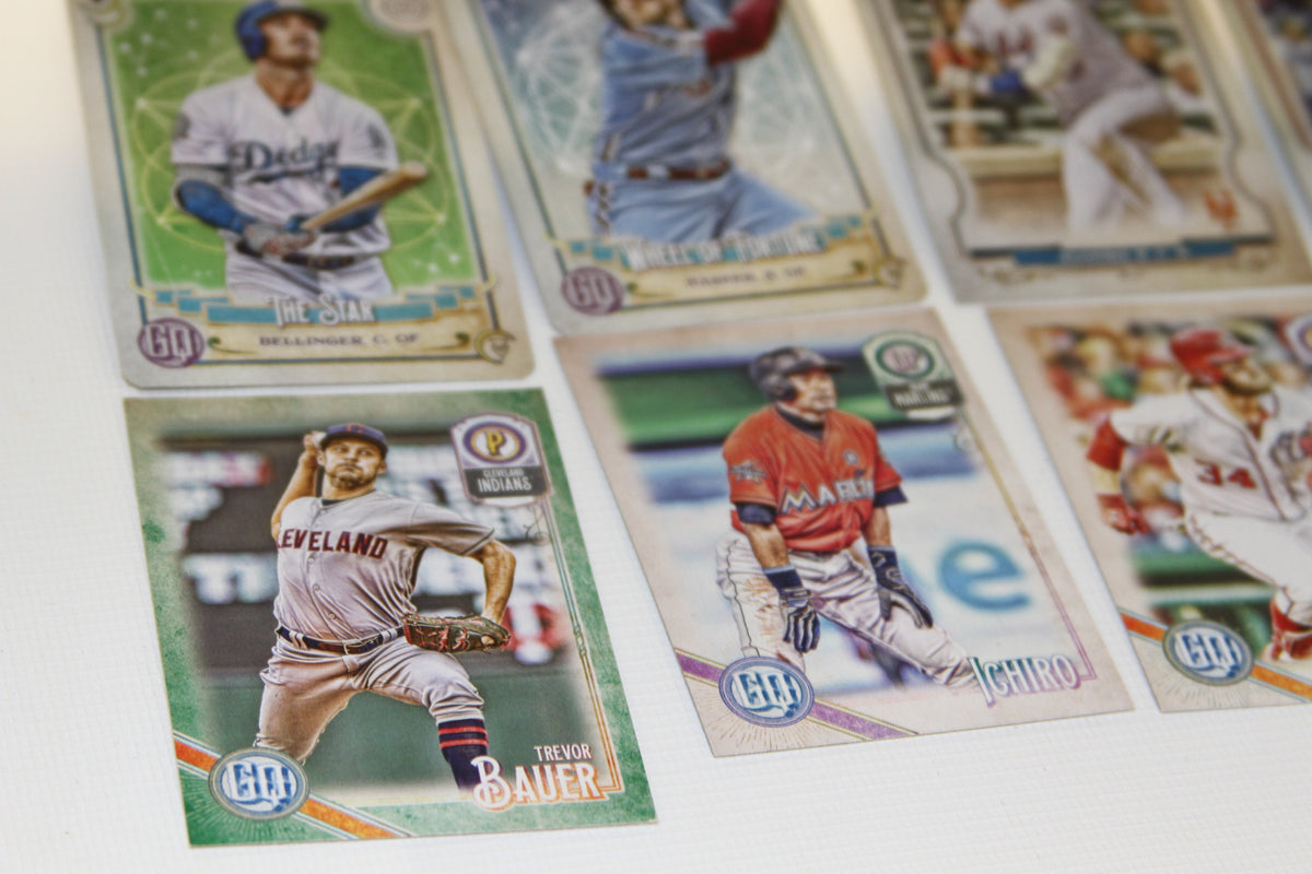 Close-up of Trevor Bauer, Ichiro, Bryce Harper, Albert Pujols, Cody Bellinger baseball cards
