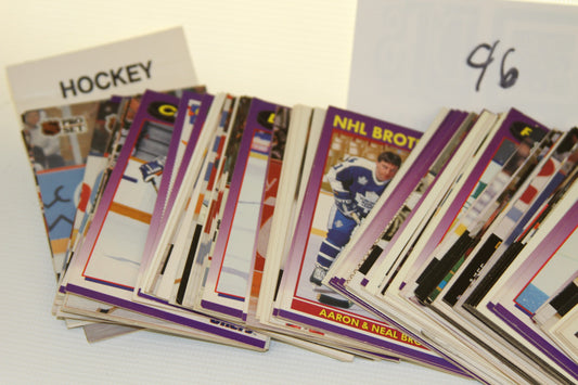 Close-up of Pro Set and NHL Brothers hockey trading cards