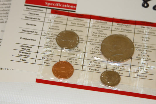Close-up of coins and specification card from 1986 US Mint uncirculated set