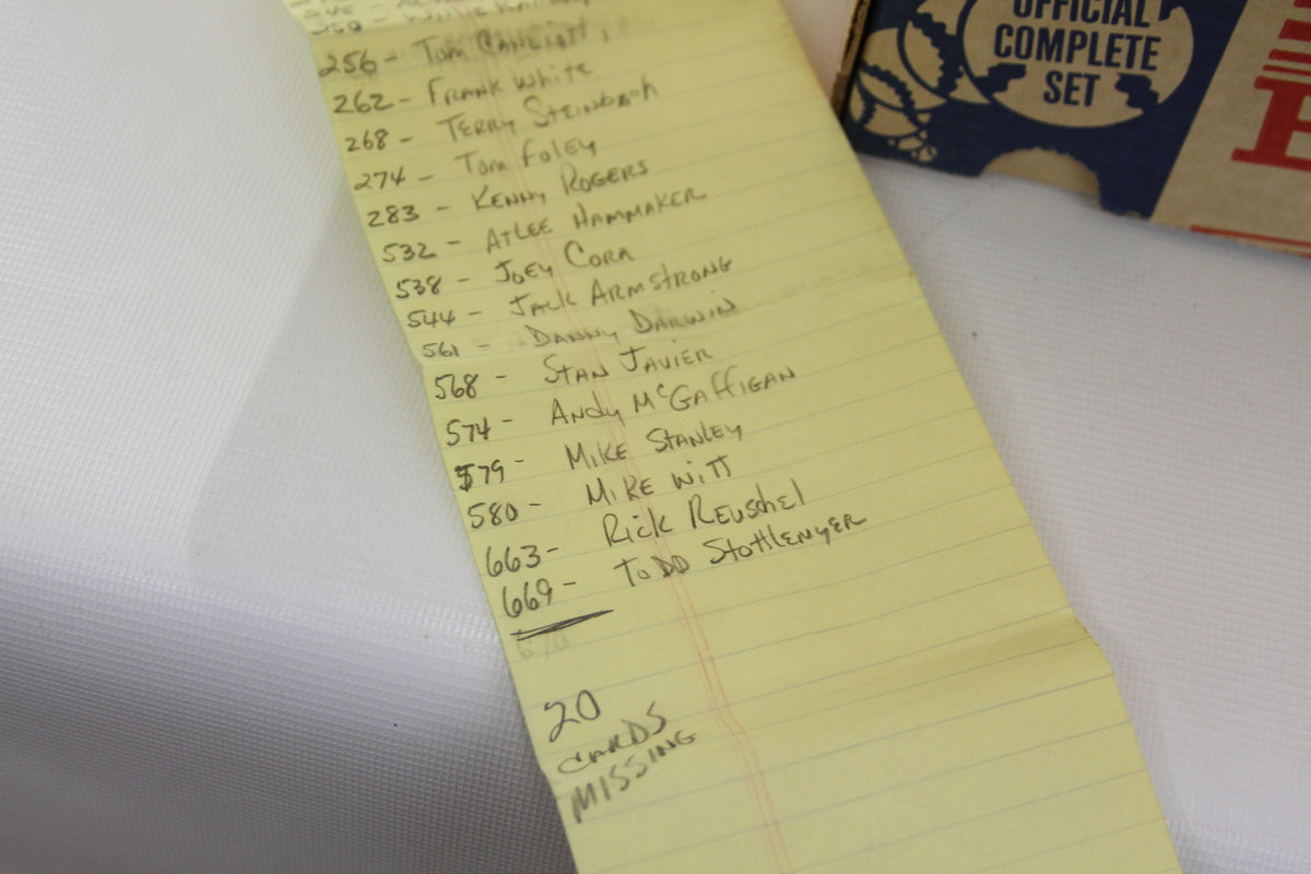 Handwritten checklist noting missing and included cards in the 1990 set