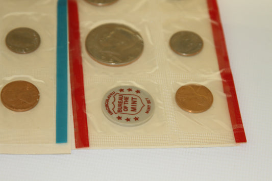 Closeup of 1972 U.S. Mint Set coins in red edged sleeve with mint token