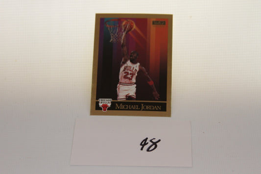 Full view of Michael Jordan 1990 SkyBox trading card with handwritten number 48 card in front