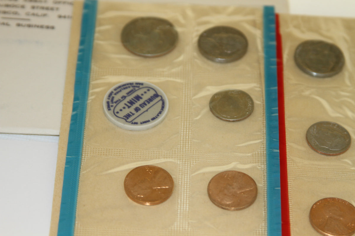 Close-up of US Mint uncirculated coin set in blue-edged plastic sleeve