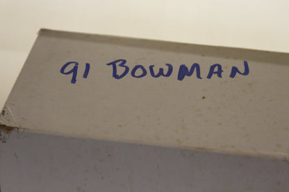 Close-up of 91 Bowman handwritten label on box