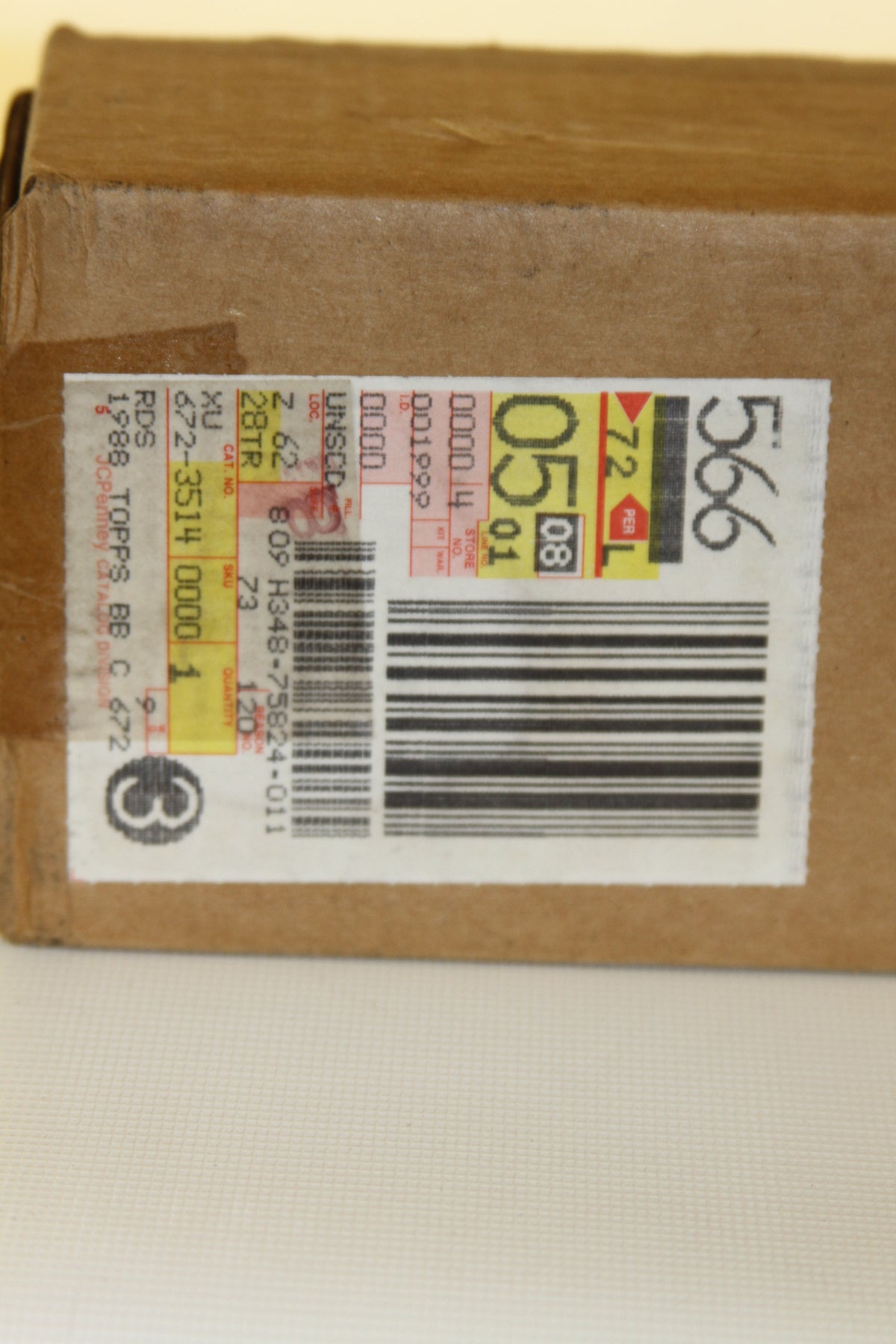 Close-up of shipping barcode and catalog label on box