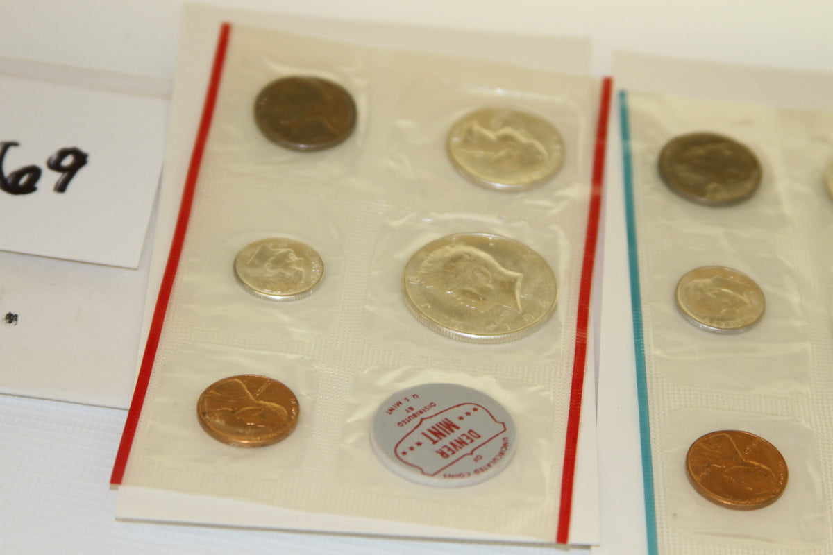 Closeup of 1964 Denver Mint uncirculated coins in original packaging