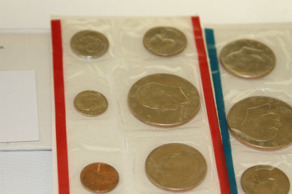 Close-up of left panel coins in red-edged packaging from 1974 U.S. Mint set