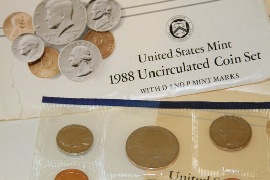 Close view of United States Mint 1988 Uncirculated Coin Set envelope and coins