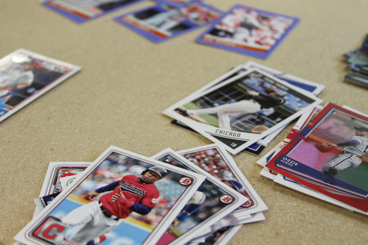 Assorted baseball cards spread out on a table