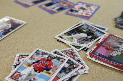 Assorted baseball cards spread out on a table