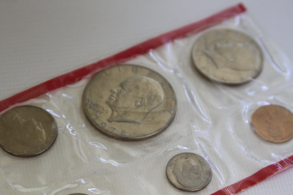Detail of 1978 U.S. Mint uncirculated coins featuring Eisenhower dollar in original packaging