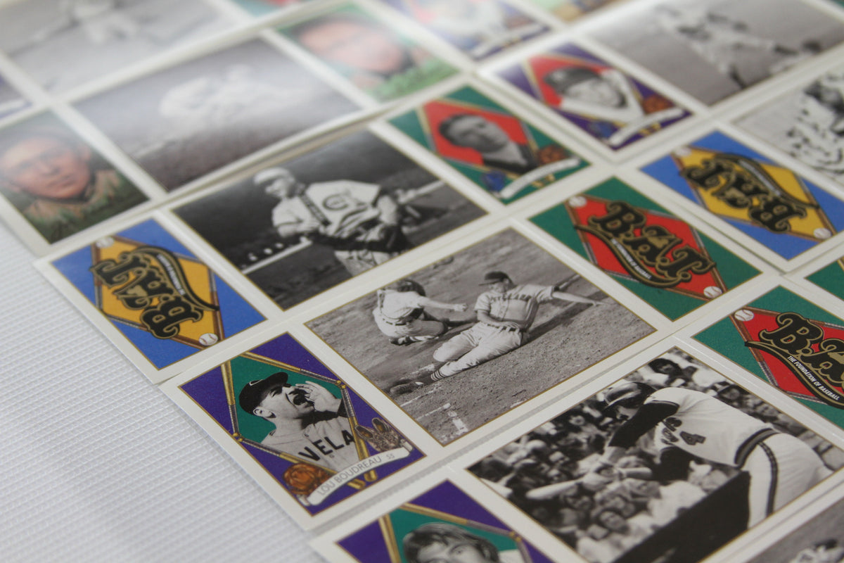 Detailed angle of black-and-white action photo cards and colorful logo cards from uncut sheet