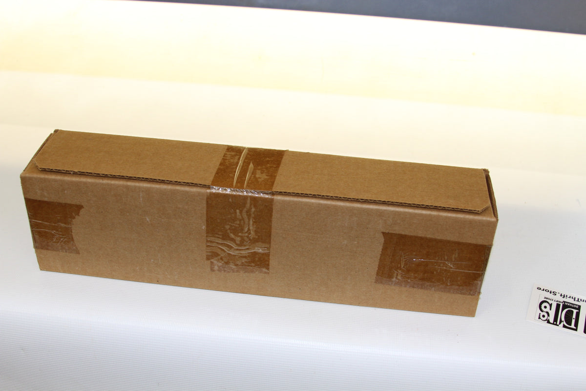 Back view of sealed brown cardboard storage box