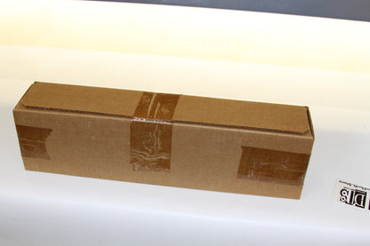 Back view of sealed brown cardboard storage box