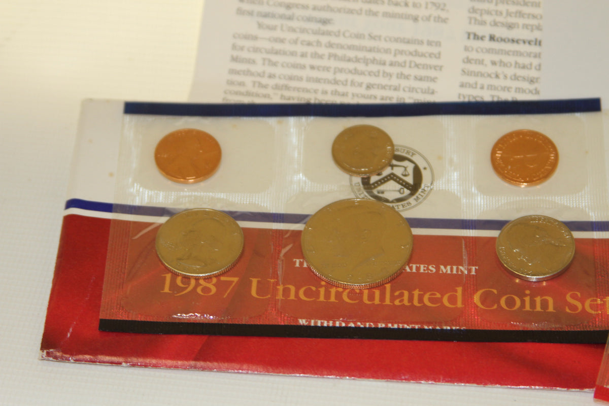 Partial view of 1987 Uncirculated Coin Set with visible coins and packaging
