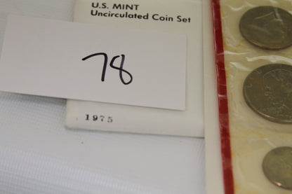 Packaging detail from 1975 U.S. Mint Uncirculated Coin Set showing year and mint label