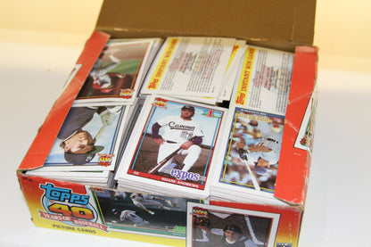 Open 1991 Topps Baseball box showing stacks of trading cards