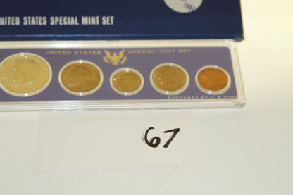 Full view of 1967 Special Mint Set showing five U.S. coins in protective case