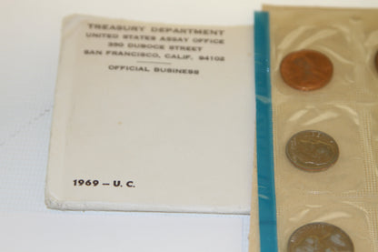 Envelope from United States Assay Office San Francisco next to sealed coins