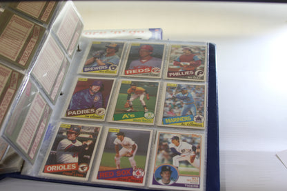 Binder page showing O-Pee-Chee and Topps baseball cards, including Rick Manning and Bo Diaz