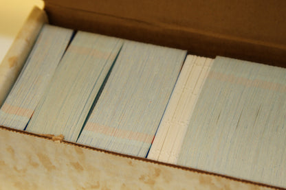 Detailed view of stacked baseball cards in box