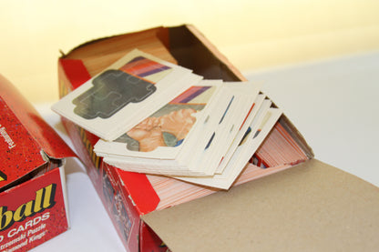 Donruss Baseball box with puzzle pieces displayed on top of cards