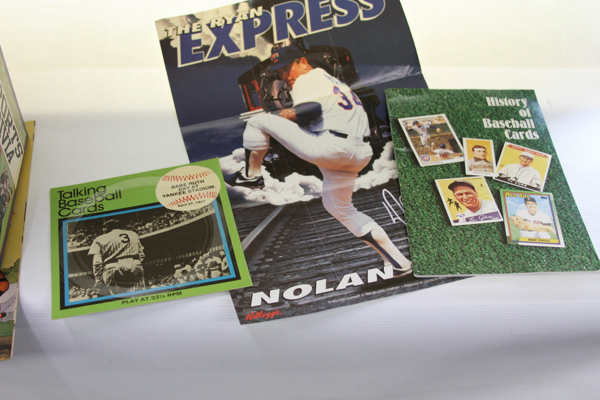 Baseball memorabilia with The Ryan Express poster and books