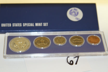 Reverse sides of all five 1967 Special Mint Set coins with blue U.S. Mint box