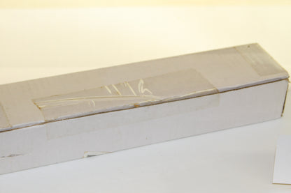 Side view of sealed white cardboard Topps box