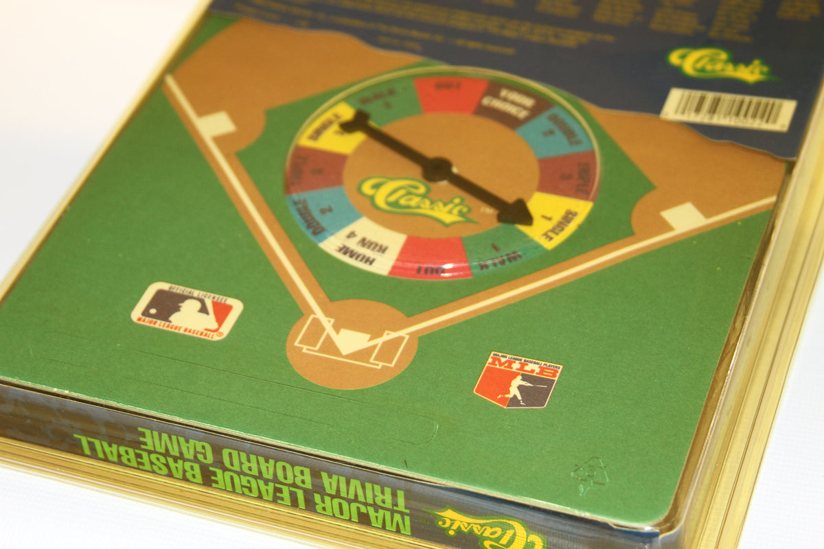 Back of board game showing action spinner and baseball diamond design