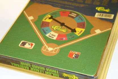 Back of board game showing action spinner and baseball diamond design