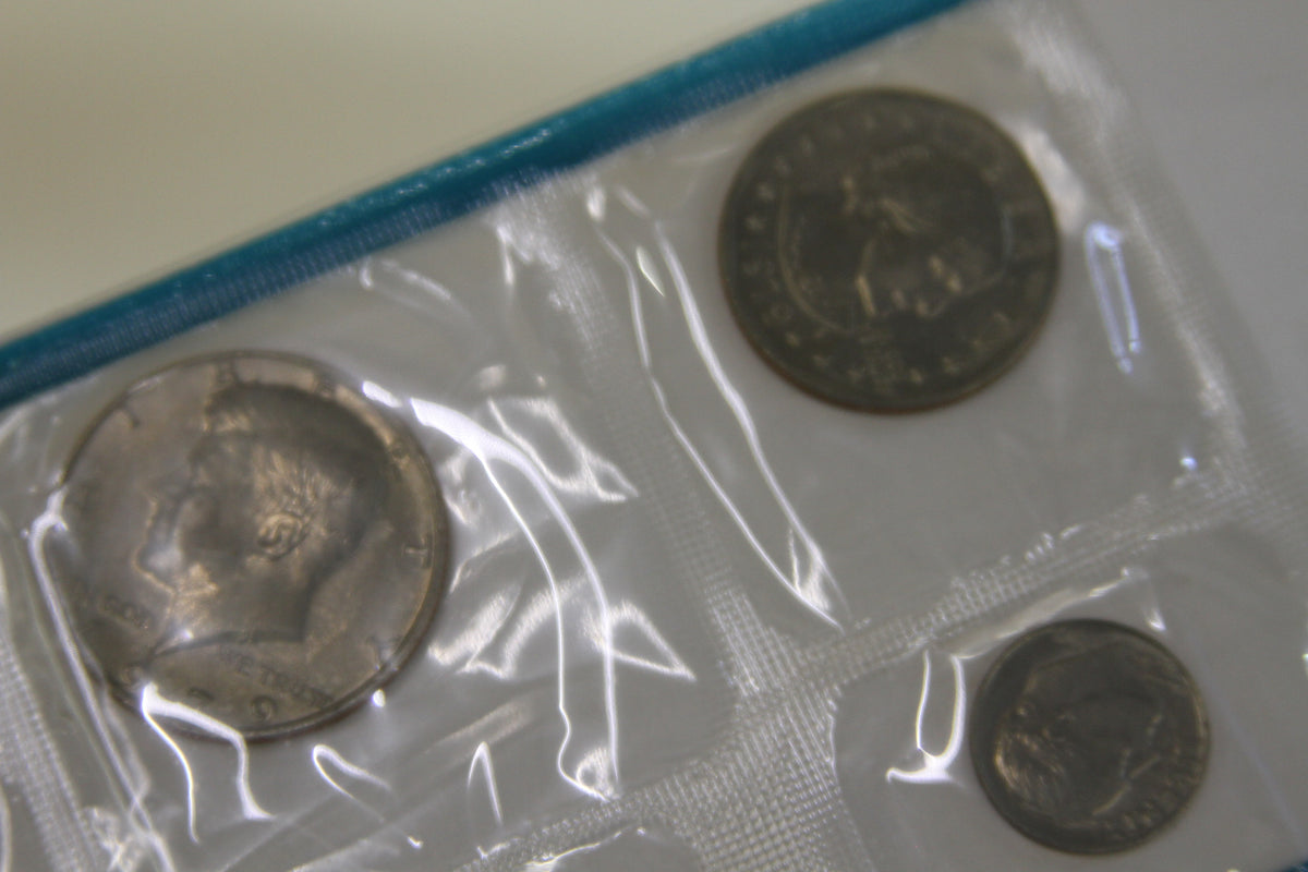 Close-up of coins in blue-sealed half of 1979 Mint set packaging