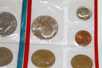 Detail of Eisenhower dollar and Lincoln cent in uncirculated Mint packaging